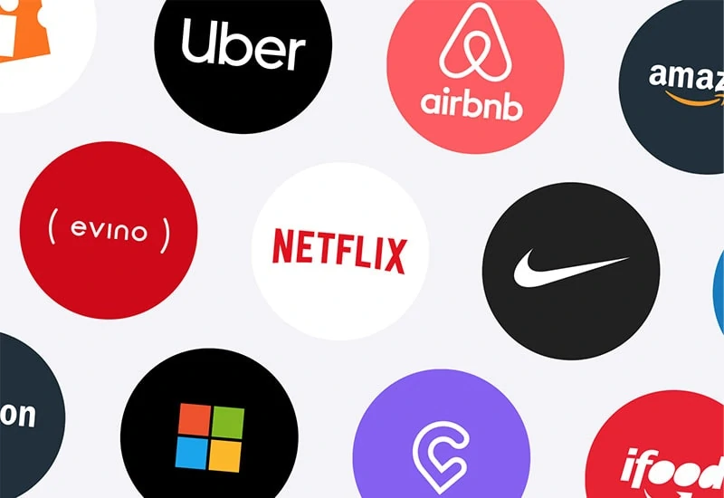 Logos de várias marcas famosas como Netflix, Uber, Airbnb e Nike, usadas como exemplo da importância de uma boa Experiência do Usuário (UX).